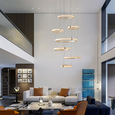 Nordic Indoor Villa Duże oświetlenie żyrandol Modern Creative Ring Hollow Rotating Pendant Light